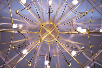 View of the chandelier from below, the chandelier in the form of a web close-up. Horizontal photography