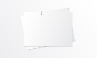 Blank paper realistic mockup with paperclip 