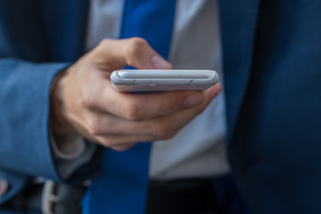 business man closeup with mobile phone
