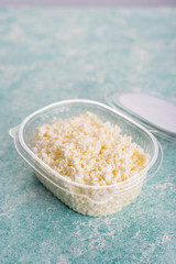 Cottage cheese in plastic packaging.