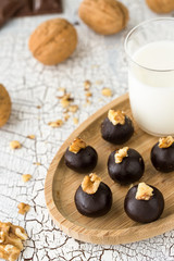 Cacao balls with milk and walnut.