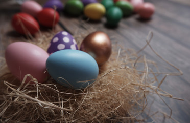 Close up Easter eggs on wooden table.