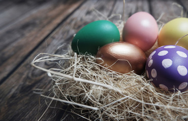 Close up Easter eggs on wooden table.