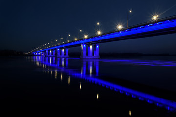 Fototapeta na wymiar bridge river lights reflection ice drift night