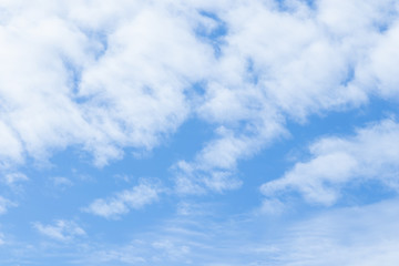 Naklejka na ściany i meble Background of blue sky and white clouds