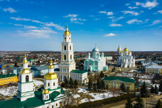 Aerial drone view of Cathedral Square Holy Trinity Seraphim-Diveevo monastery near belfry and Trinity Cathedral in Diveevo