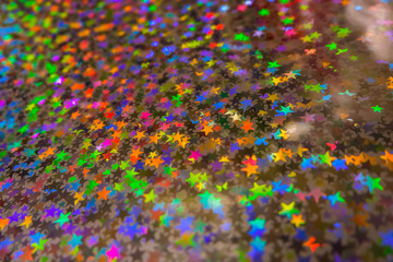Fototapeta na wymiar The seven colors of the beautifully sparkling hologram sheet