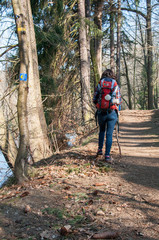 Fototapeta na wymiar Pilgrim on the trail of St. James, Pilgrim, Wanderer with a backpack and a shell