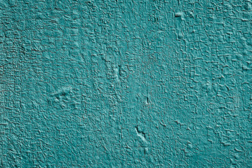 old wooden surface with cracked faded paint