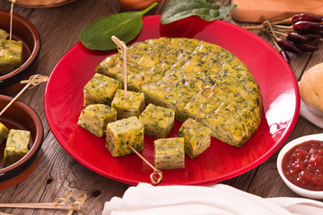 Spanish omelette with spinach.