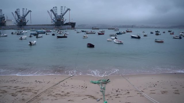 fishing boats docked at Trafaria, Margem Sul, Lisboa, Portugal - Open shot