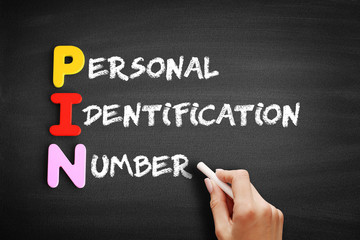 Fototapeta premium Color Wooden alphabets building the word PIN - Personal Identification Number acronym on blackboard