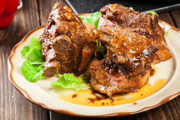 Pork spare ribs served on a plate