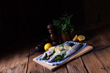 fresh trout with lemon and different herbs