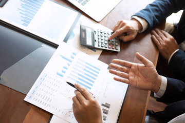 Business people team discuss on meeting to planning investment project working and strategy of business making conversation with partner, financial and accounting concept