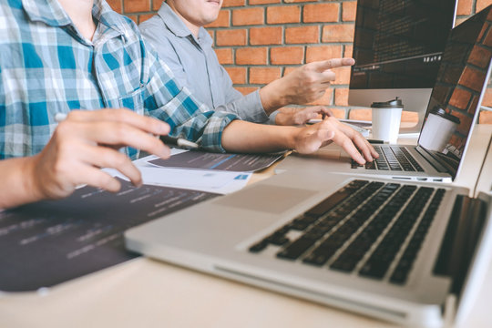 Team of Professional Developer programmer cooperation meeting and brainstorming and programming in website working a software and coding technology, writing codes and database