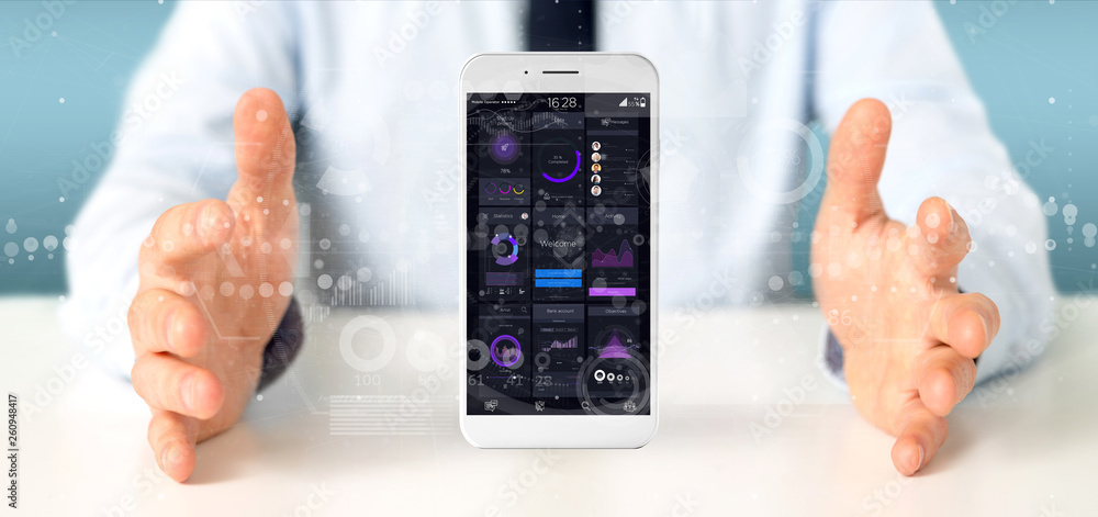 Poster businessman holding smartphone with user interface data on the screen isolated on a background