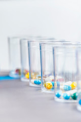 Pills in a Disposable Plastic Cup