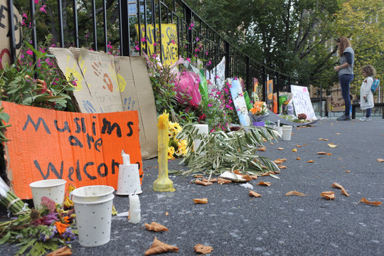 Mother And Daughter Looking At Tributes To Honour Christchurch Mosque Shooting Victims