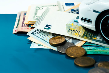 Money Background of euro , us dollar coins and banknote with calculator, use as growth of return of investment or financial concept. grainy analogue film look.