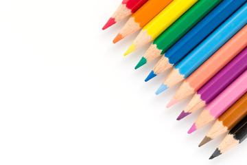 Closeup of color pencils isolated on a white background