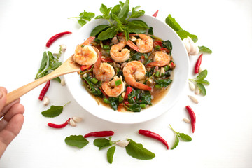 stir fried shrimp basil and red shilli ,garlic on white background