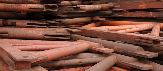 Disassembled metal construction industrial pile of steel structure parts