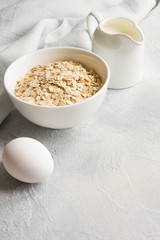 Eggs, whreat, cereals and milk for cooking useful food.