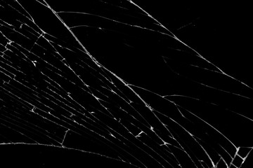 cracked glass isolated on a black background. broken glass
