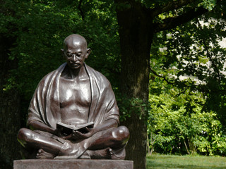 Geneva, Switzerland. 07/31/2009. Statue of Mahatma Gandhi in the Ariana Park - obrazy, fototapety, plakaty