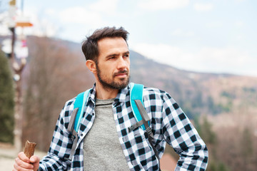 Handsome man enjoying the view during hiking trip