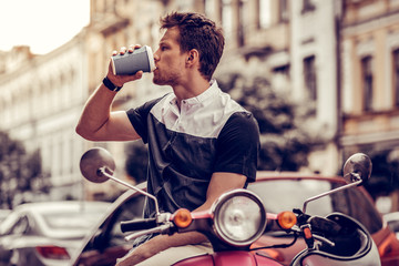 Handsome good looking man drinking his coffee