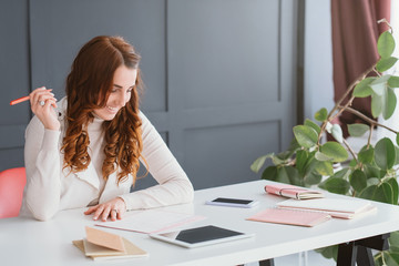 Scheduling agenda. Ambitious marketing plans. Content smm woman at workplace. Timetable, tablet and...