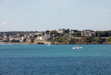 Fototapeta premium View from the ramparts at marina and the town of Dinard. Saint Malo, Brittany, France