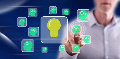 Man touching a teamwork idea concept