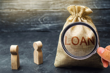 The concept of Loan. Businessmen are discussing questions about the company's loans. The financial...