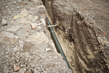 The street of the city is torn down. Construction and laying of pipelines and sewerage. Chernivtsi,...