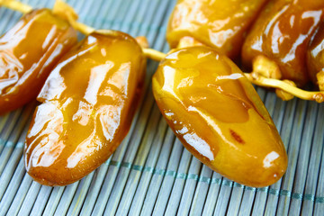 Sweet arabic algerian dates fruits on a wooden floor