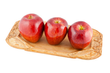 Three red apples