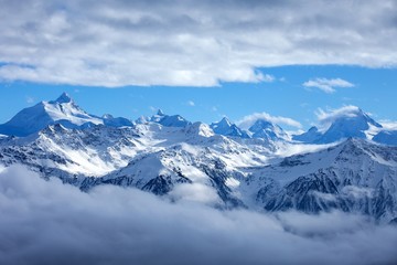 Obraz na płótnie Canvas Swiss Alps scenery. Winter mountains. Beautiful nature scenery in winter. Mountain covered by snow, glacier. Panoramatic view, Switzerland, holiday destination for sports and hiking, wallpaper