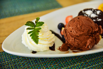 Ice cream is on the plate in shop