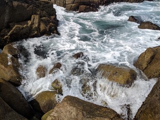 Ocean beach California  sand rock  on the beach