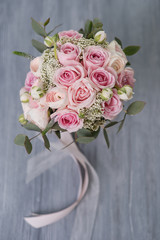 stylish wedding attributes of bride. classic bride's bouquet