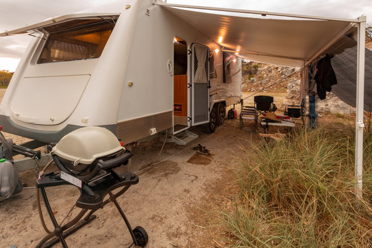 Large modern caravan setup for bush camping near the seaside in Australia.