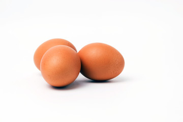 brown eggs not painted on a white background isolated