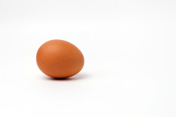 brown one egg not painted on a white background isolated