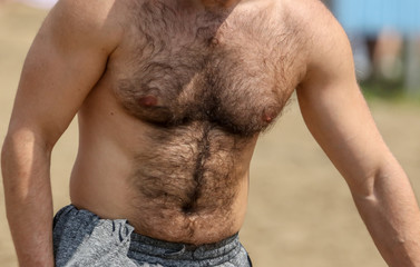 Naklejka premium A man with hair on his chest