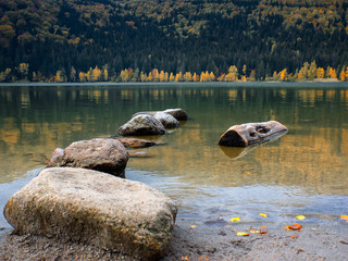 Autumn's sweet breath chills the sleepy land