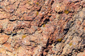 Stone rock in the mountains as a background