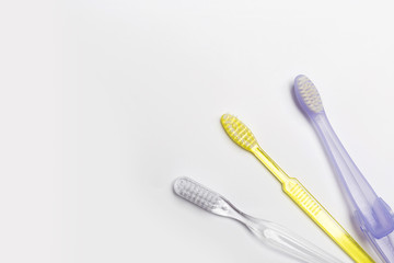 New different  toothbrushes on a white background